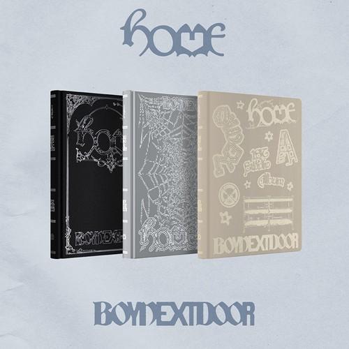 BOYNEXTDOOR HOME — trzy wersje photobooków w twardej oprawie: czarny NAVIGATOR ze srebrnym ornamentem, szary WEAVER z pajęczyną i beżowy BUNKER z naklejkami